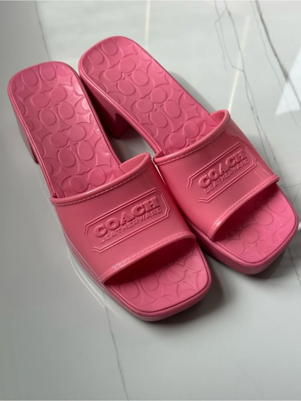 Coach Pink Slide Mules with Embossed Logo Strap